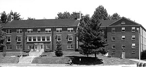McLaughlin Hall from Edgewood Road with bicyclist in foreground.