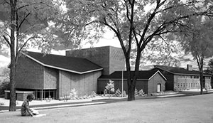 Paul Creative Arts Center with woman reading in foreground, by Jack Adams.
