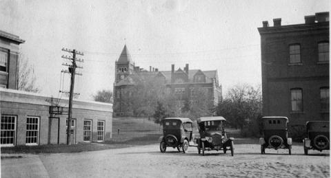 Cars parked in Conant Hall Courtyard, 1924