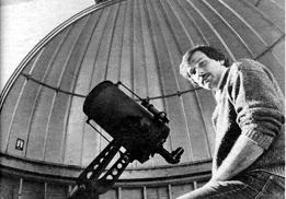 man with telescope at the UNH observatory